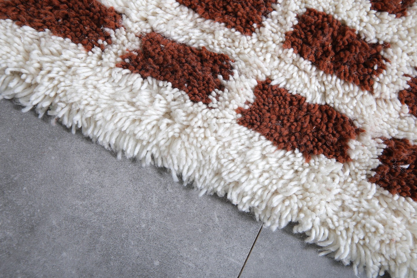 White and brown checkered moroccan rug