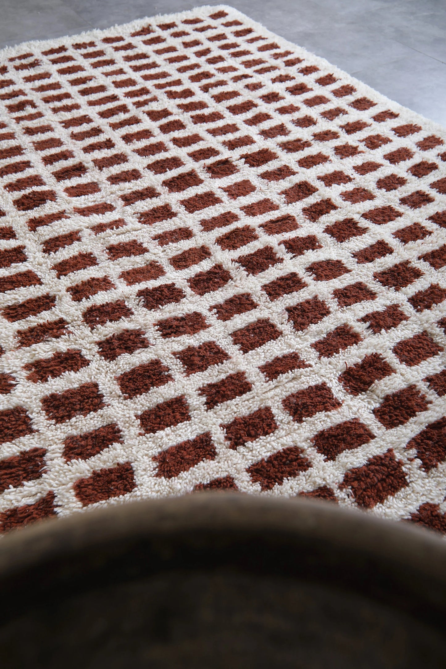 White and brown checkered moroccan rug