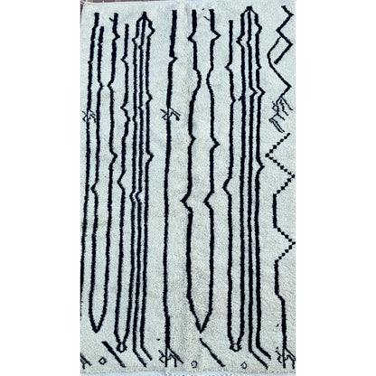 Tapis artisanal en laine Tribal Echoes-250x150cm