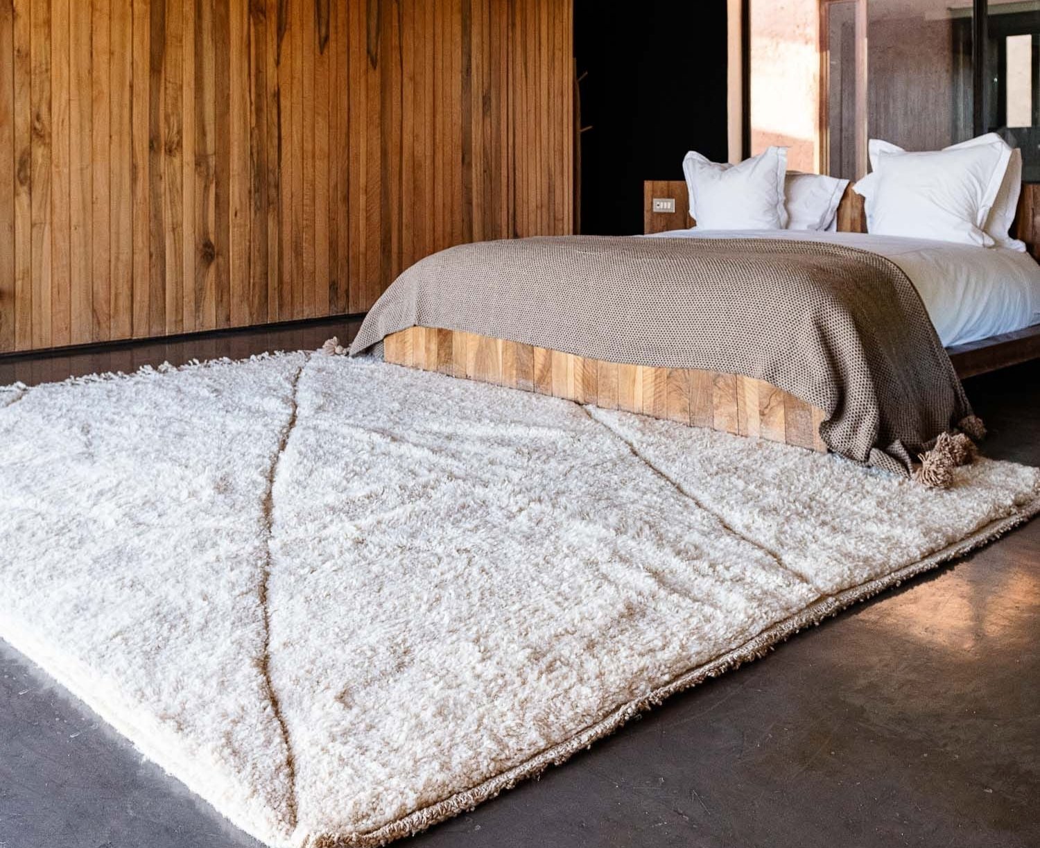 white moroccan rug on bedroom